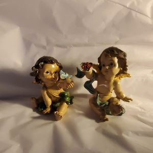 Two,  adorable little cherubs. 3 and 4 inches tall